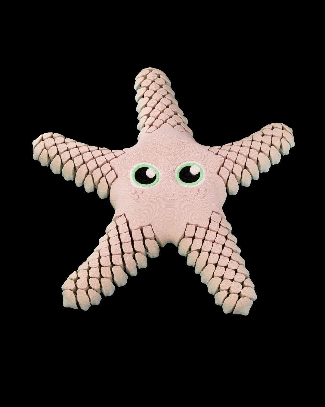 3D printed Star Fish with eyes and a black background